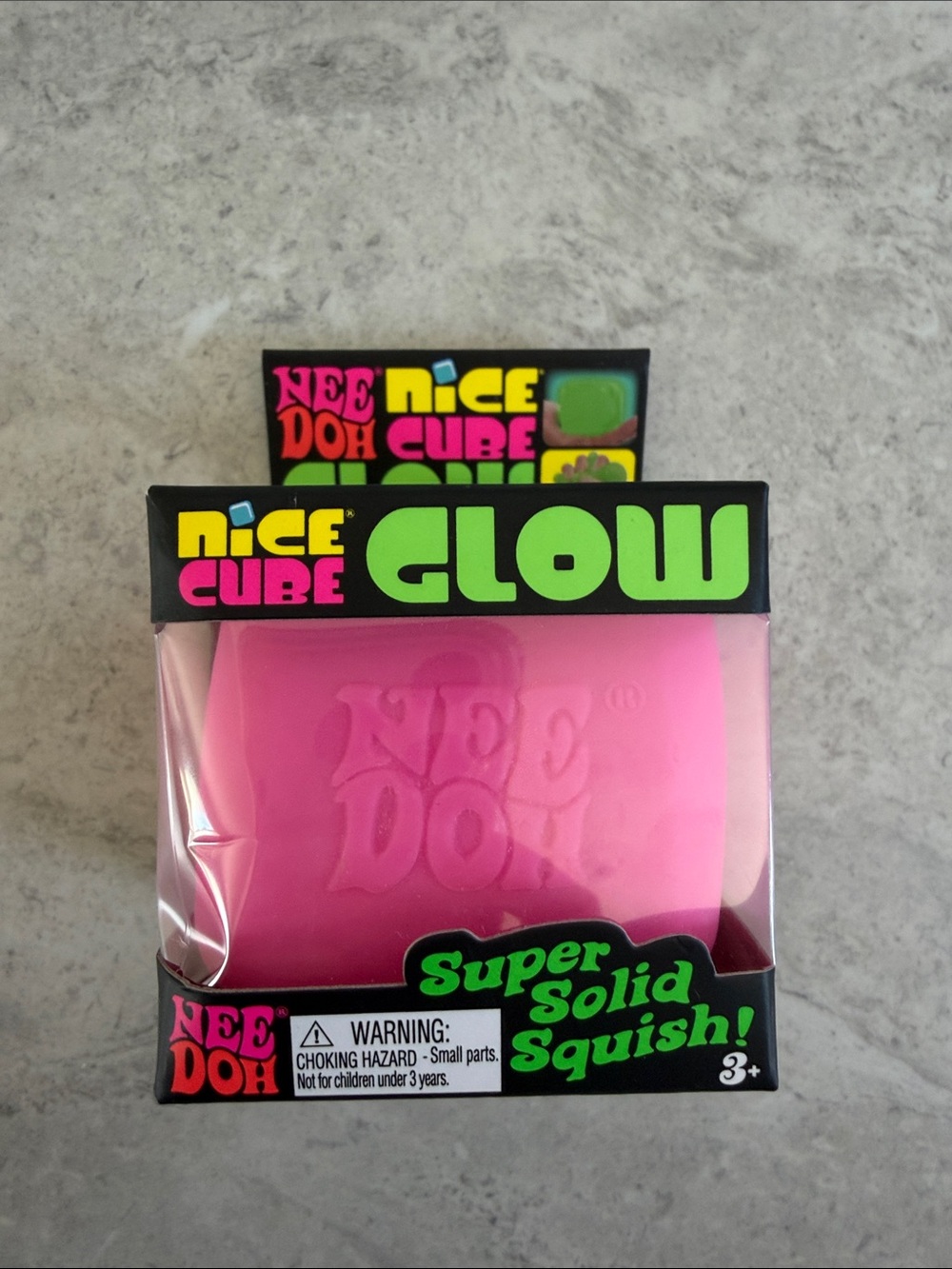 Glow Super Solid Squish Toy — Pink sealed in box